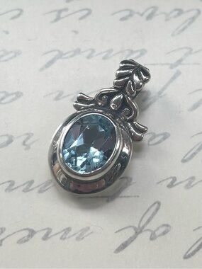 Sterling Silver Blue Topaz Oval Bali Pendant
